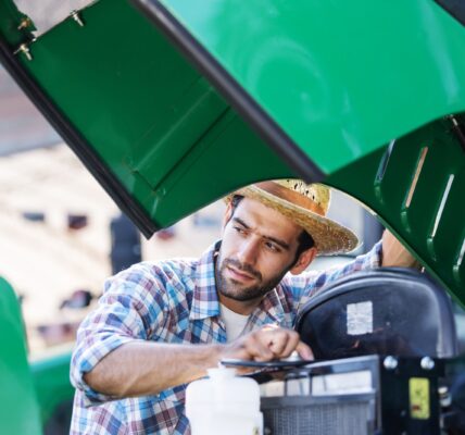 farmers inspect and repair engines 2025 04 20 17 38 15 utc